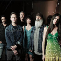 Members of band Third Secret stand together