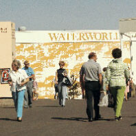 People walking by the Spokane Expo 74 Waterworld Pavilion