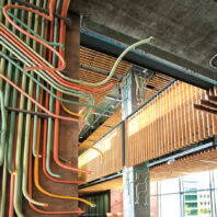 tubes intertwined on a wall