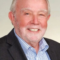 Profile photo of David Longanecker in blazer and checked shirt