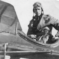 historical photo of Clyde Pangborn in cockpit