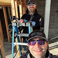 Darren Kiesler (on ladder) and Boone Helm