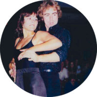 WSU woman and man embrace at a disco dance in 1970s