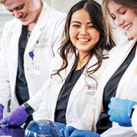 Pharmacists and pharmacy techs learning about immunization techniques