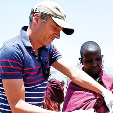 Veterinary researcher checks animals in Africa