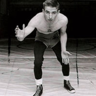 WSU wrestler Cash Stone in the practice room, 1957.