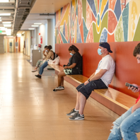 students safe distance and masked in CUB