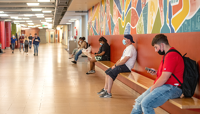 students safe distance and masked in CUB