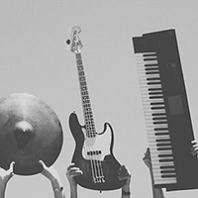 cymbal, guitar & keyboard held up in the air