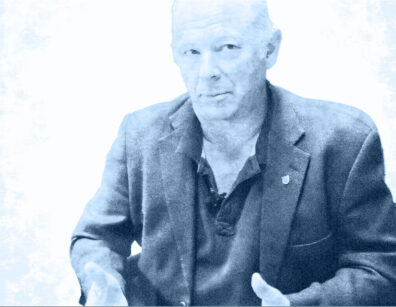 photoillustration of a middle-aged, balding man gesturing in a dark blazer with a polo shirt