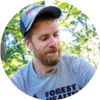headshot of a bearded man in a Washington State University baseball cap