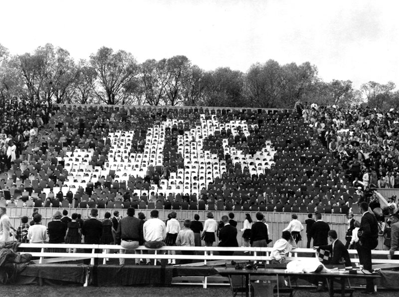 Bleachers with a group forming the WSC logo