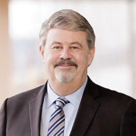 Headshot of Dennis Vermillion in a suit