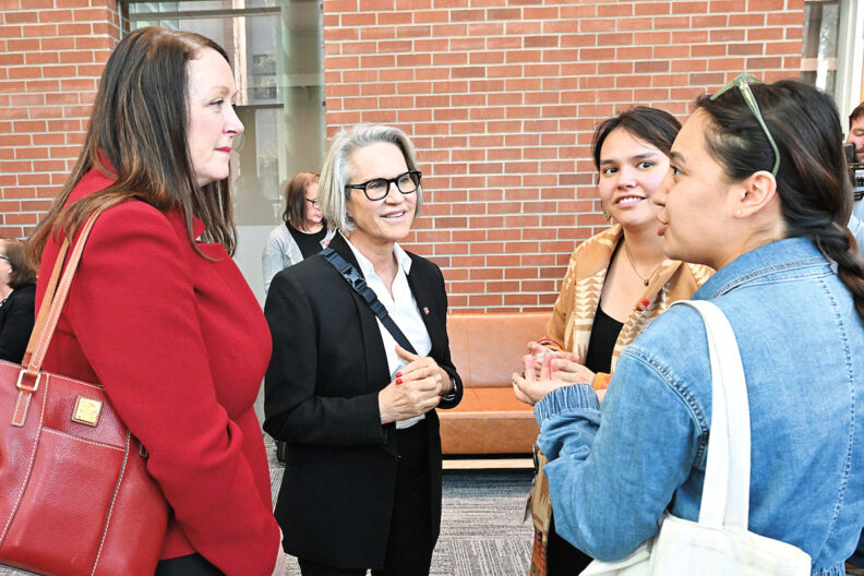 WSU President Elizabeth Cantwell listens to students on the WSU Spokane Campus