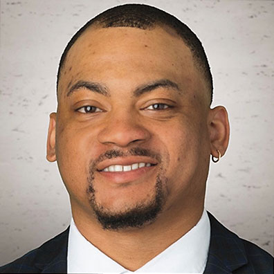 Headshot of Jeremiah Allison smiling