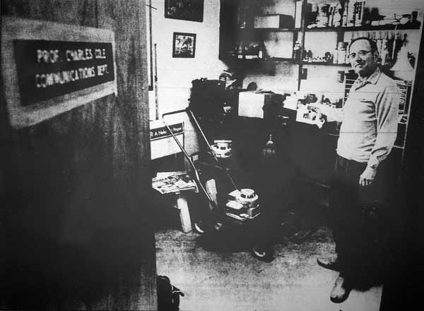 Black and white photo of WSU journalism professor Chuck Cole in his office