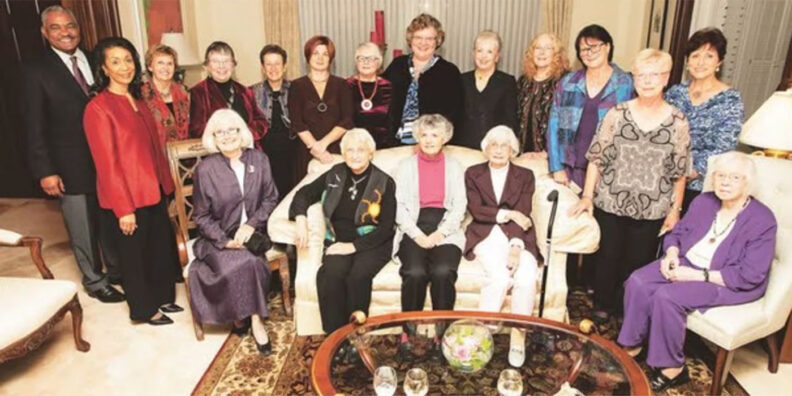Group of women gathered in a formal living room