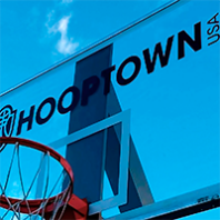 Basketball hoop with text Hooptown USA. Courtesy KHQ
