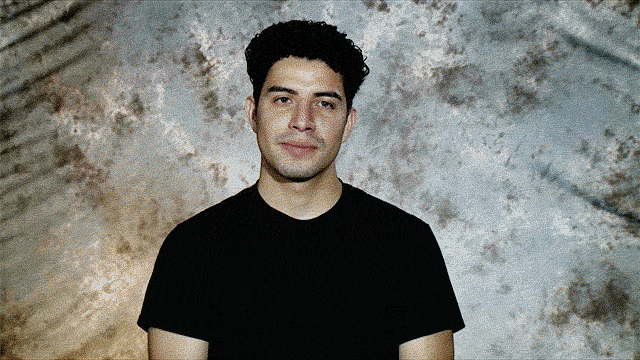 Jerry Martinez profile in black shirt talking