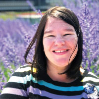 Head shot of Rachel Sanchez with purple lavender in background