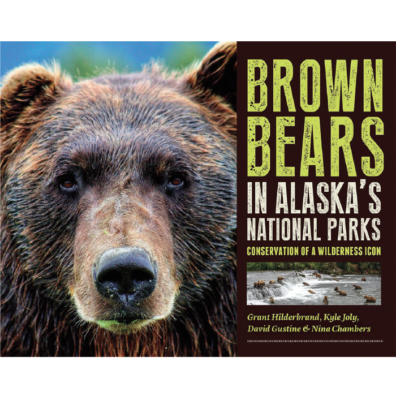 Book cover featuring a close-up of a brown bear’s face beside the title ‘Brown Bears in Alaska’s National Parks: Conservation of a Wilderness Icon.’