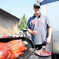 roast pig on grill