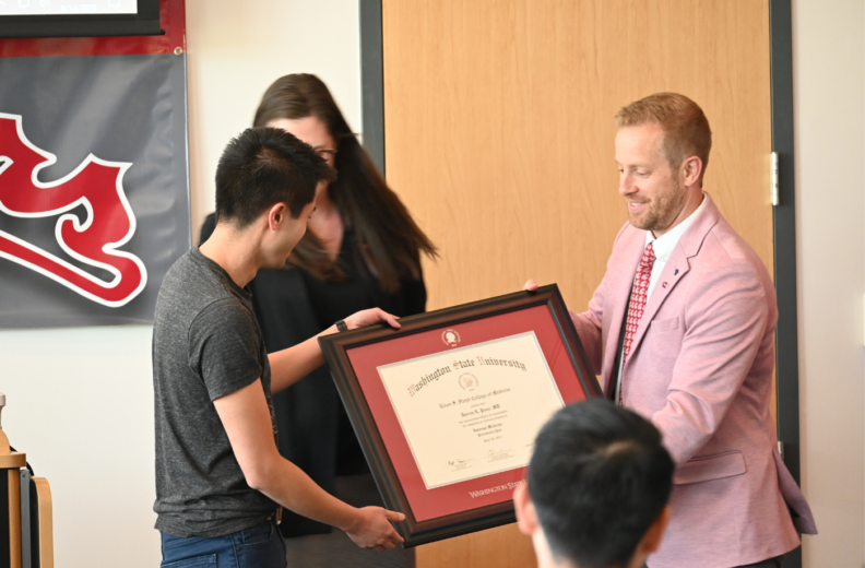 student receiving award