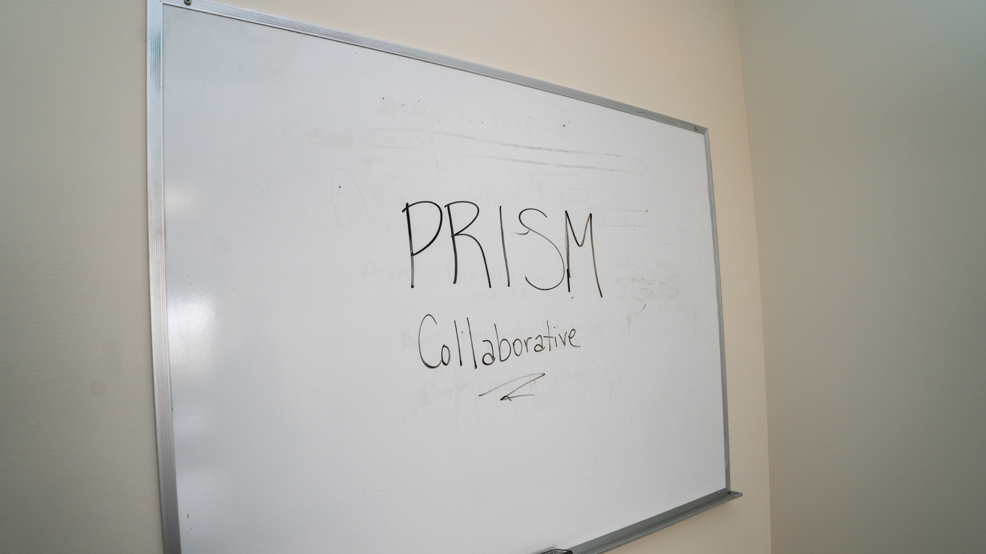 white board with PRISM Collaborative hand written