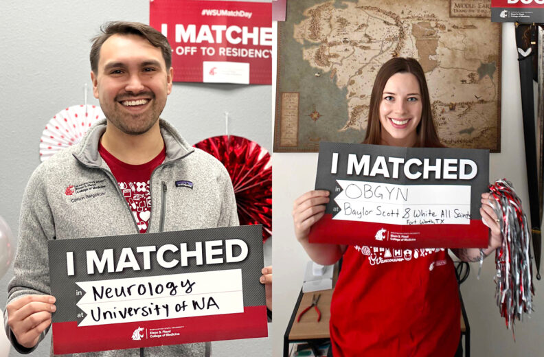 MD students Carson Bergstrom and Carter Wolf holding their match day signs.