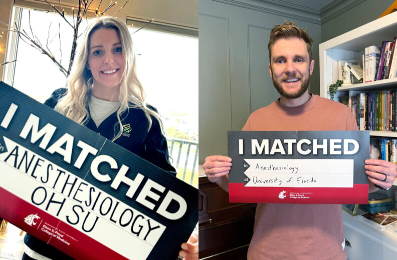 MD students Cassandra Black and K Perrins holding match day signs.