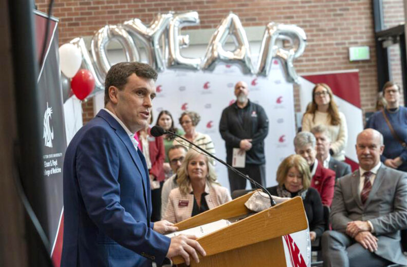 Dean Jim Record Speaking to group at 10-year anniversary celebration.
