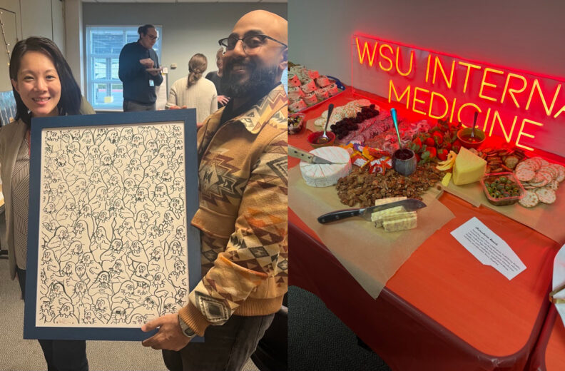 Two people hold up a large framed artwork featuring a pattern of abstract faces in black line art. In the background, others are gathered in a room. Next to this scene is a table set with an assortment of food, including cheeses, crackers, fruit, and pastries, displayed beneath a bright red neon sign that reads ‘WSU Internal Medicine.’