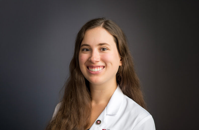 Amber Huang in her white coat.