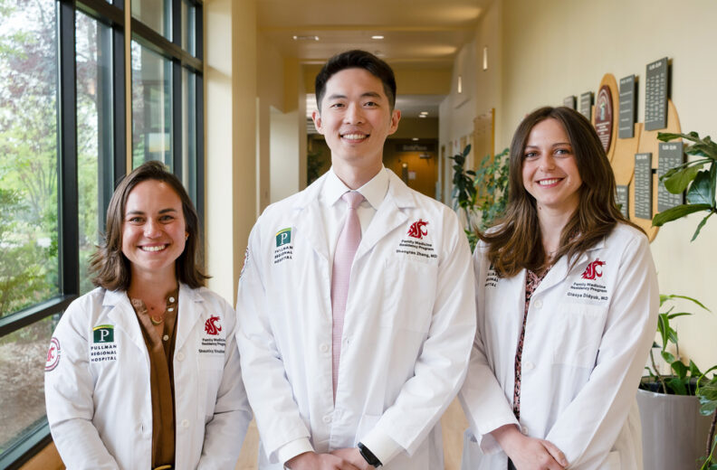 Three family medicine residents standing in the hallway at the Pullman Regional Hospital. 