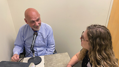 student giving speech test to a patient