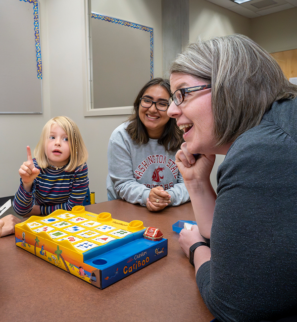 Researcher and child working in CAB Lab