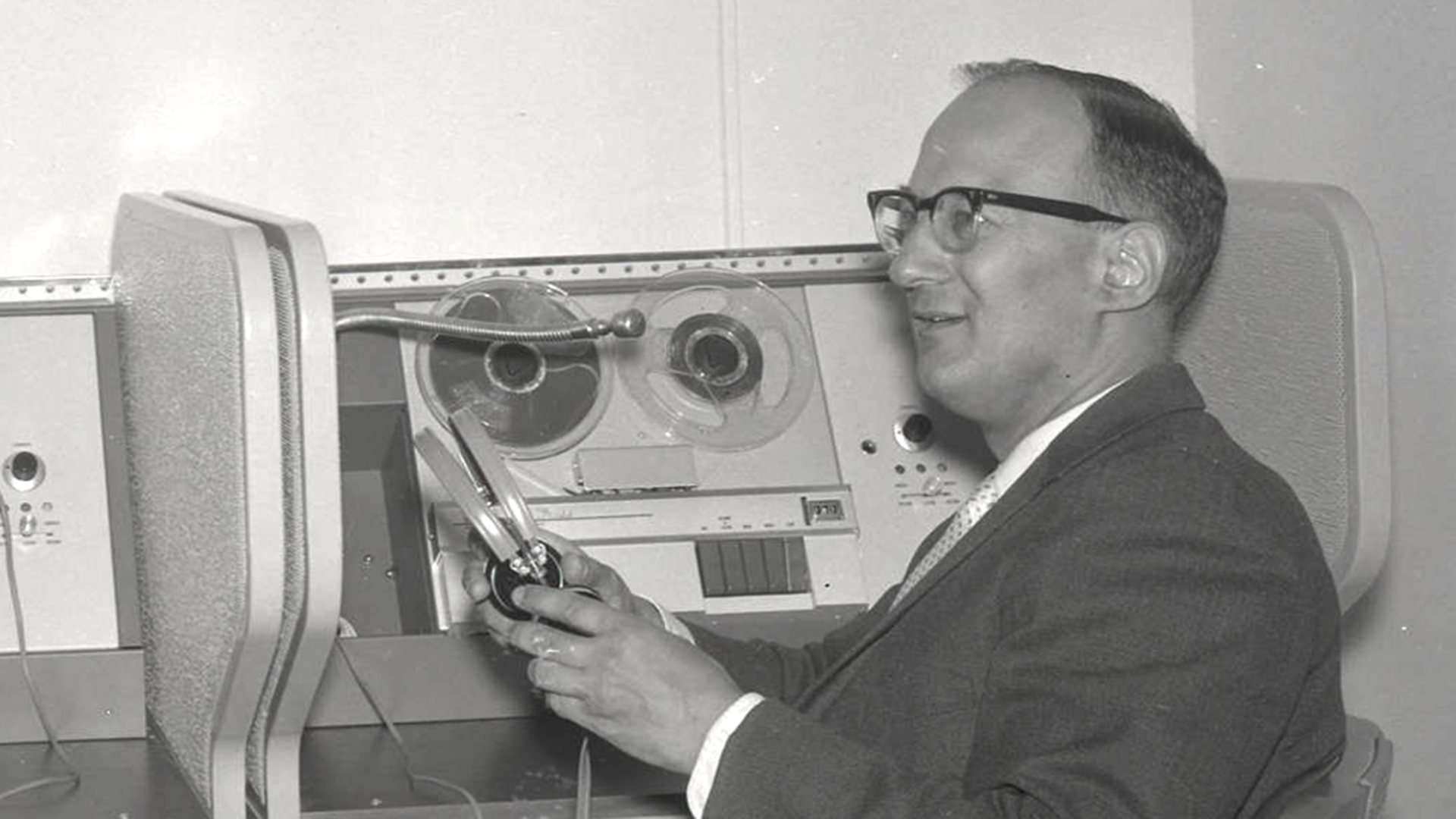 1963 photo of staff member with audio tape recorder.