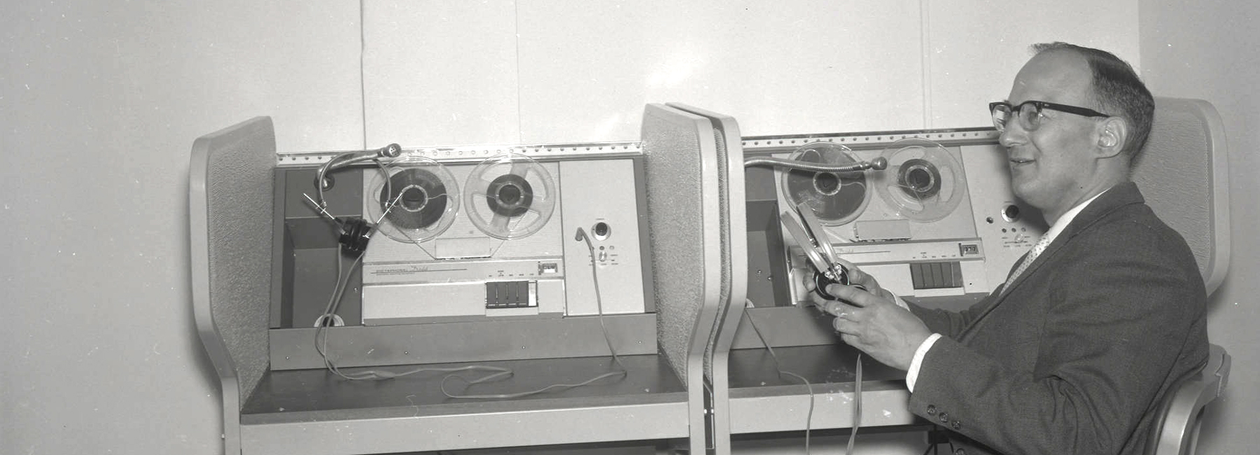 1963 photo of staff member with audio tape recorder.