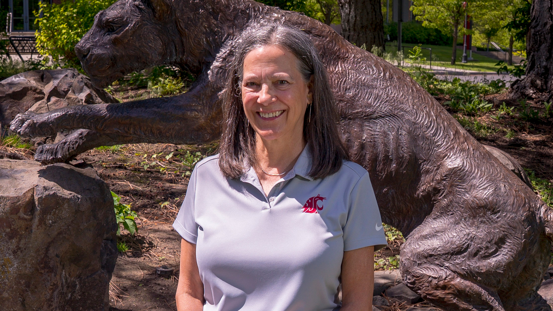 Karyn Discoll Teague sitting outside.