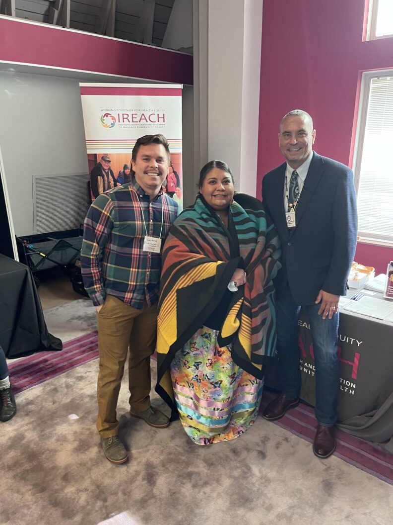 Cole Allick and Gary Ferguson with community member