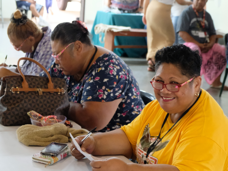 adult filling out paperwork