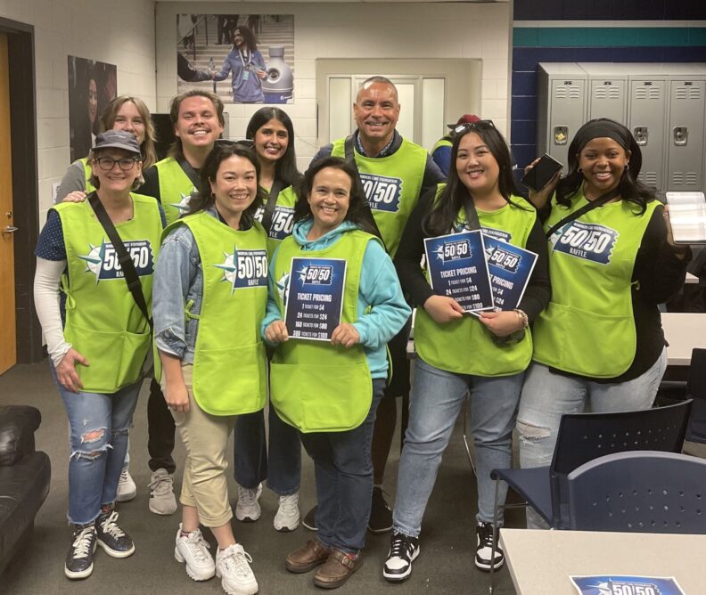 Members of IREACH volunteering at a Seattle Mariners game