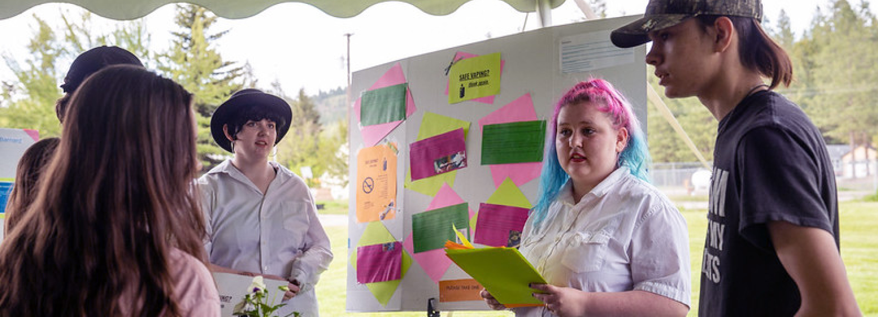 High school students giving their capstone presentation