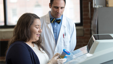 Researcher looking at a sample