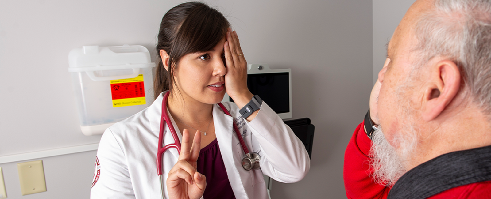 MD Student giving eye test