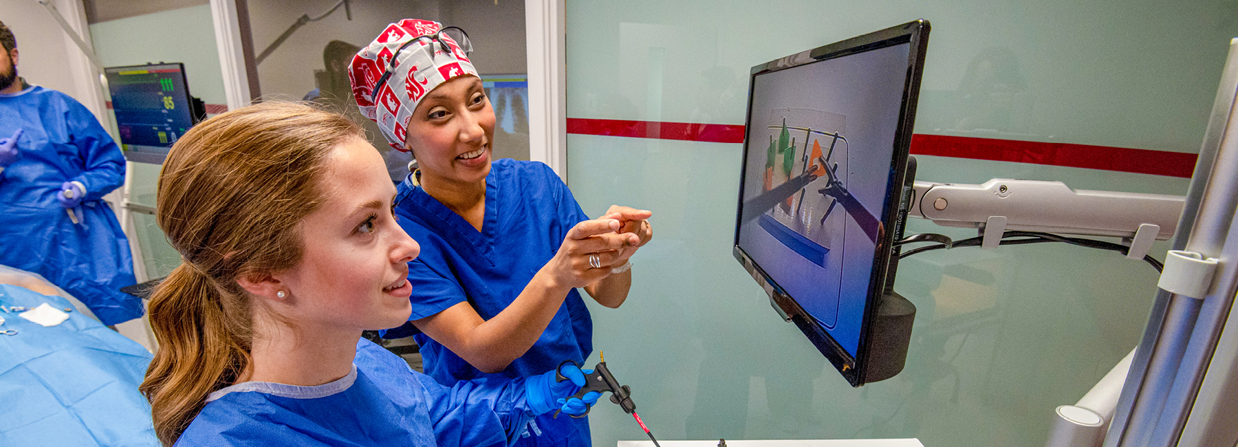 vice chair training a MD student in surgery