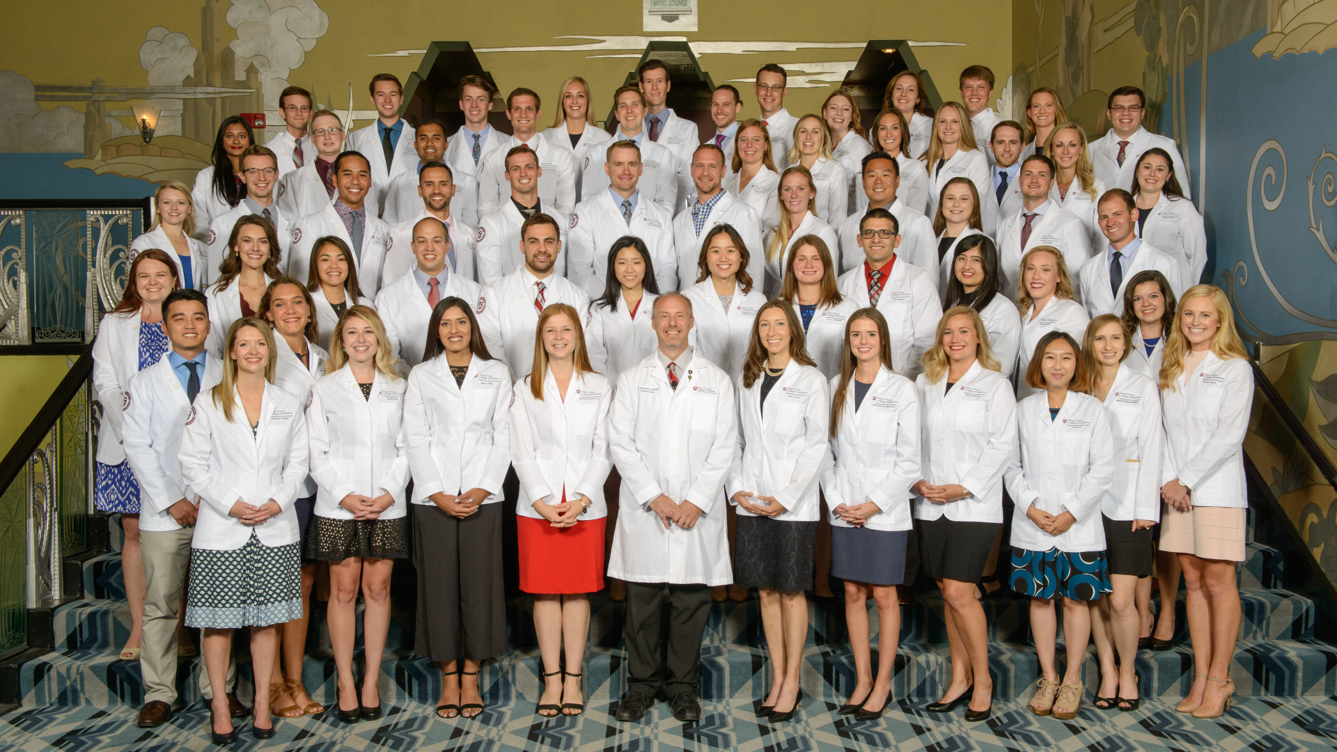 MD first class group photo at White Coat Ceremony. 