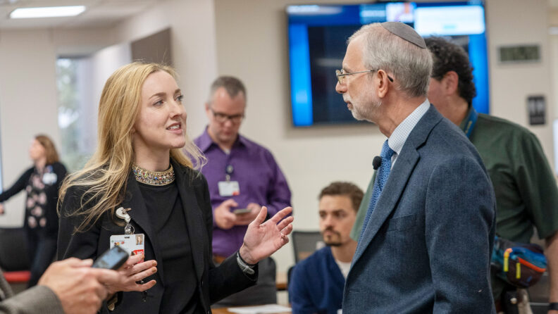 Dr Kirshblum taking with a physician at the Dr Joel DeLisa Lectureship.