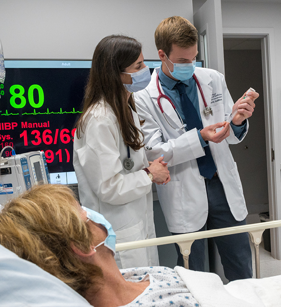 Student with patient in Virtual Clinic Center