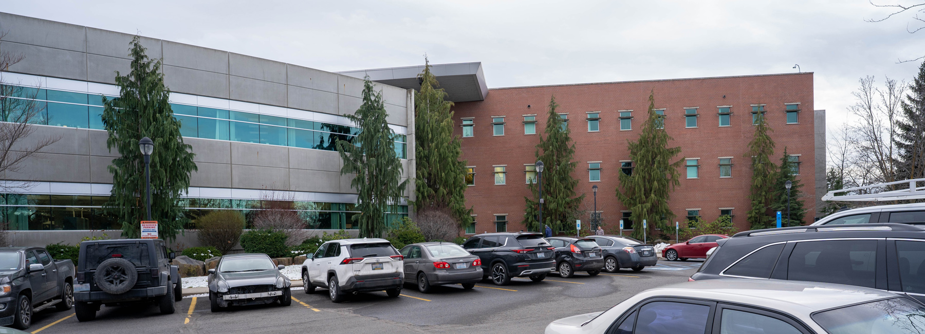 Health Sciences Building from the parking lot, looking at the building.
